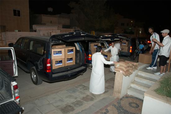 صور حملتي سلال الخير وكسوة العيد الخيرية